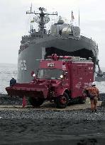 Heat-proof rescue vehicle unloaded on volcanic Miyakejima